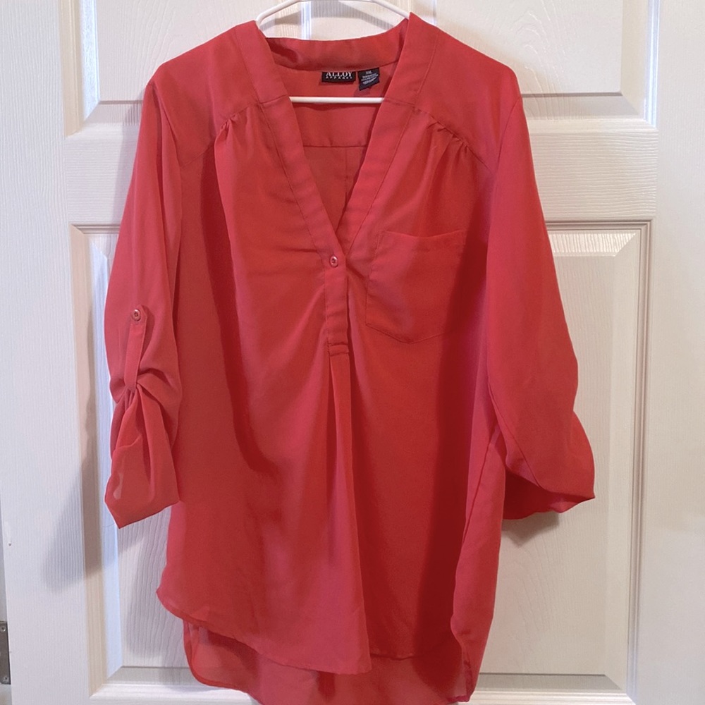 Melon colored blouse
